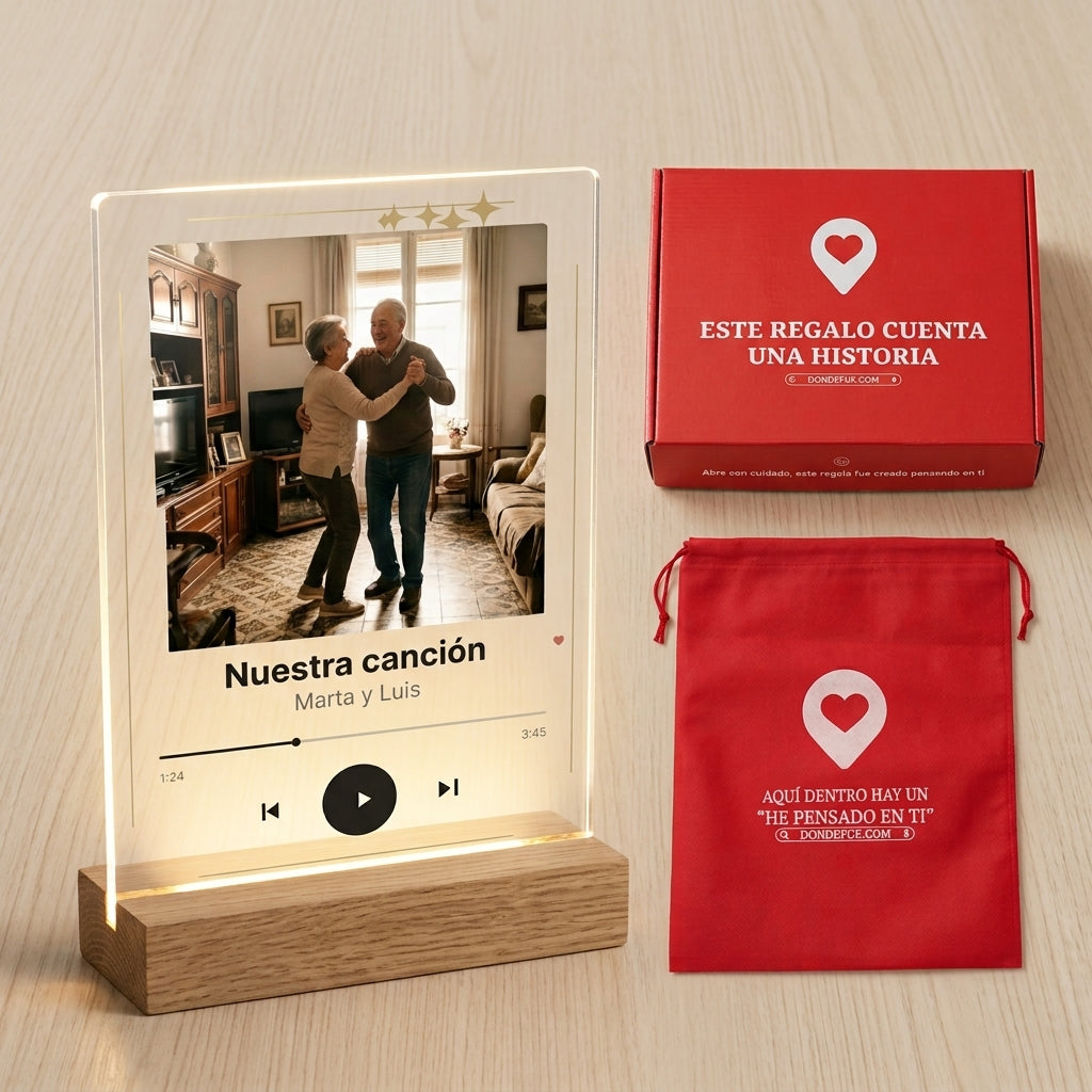 Placa de metacrilato personalizada con vuestra canción junto a la caja y la bolsa de regalo de Donde Fue