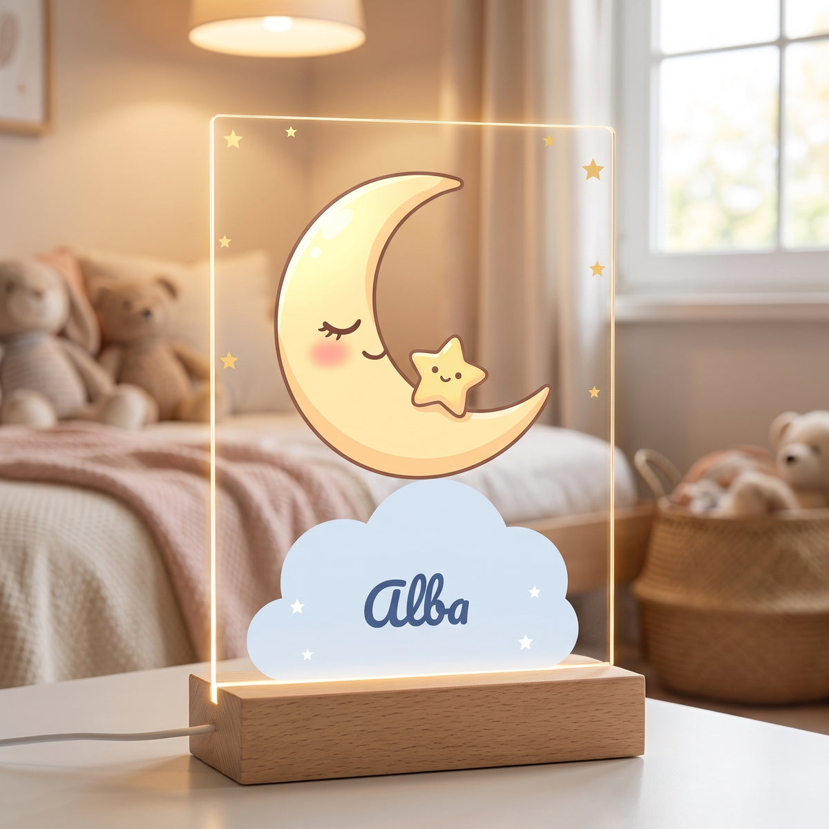 Lámpara luna personalizada encendida con luz LED cálida en un dormitorio infantil