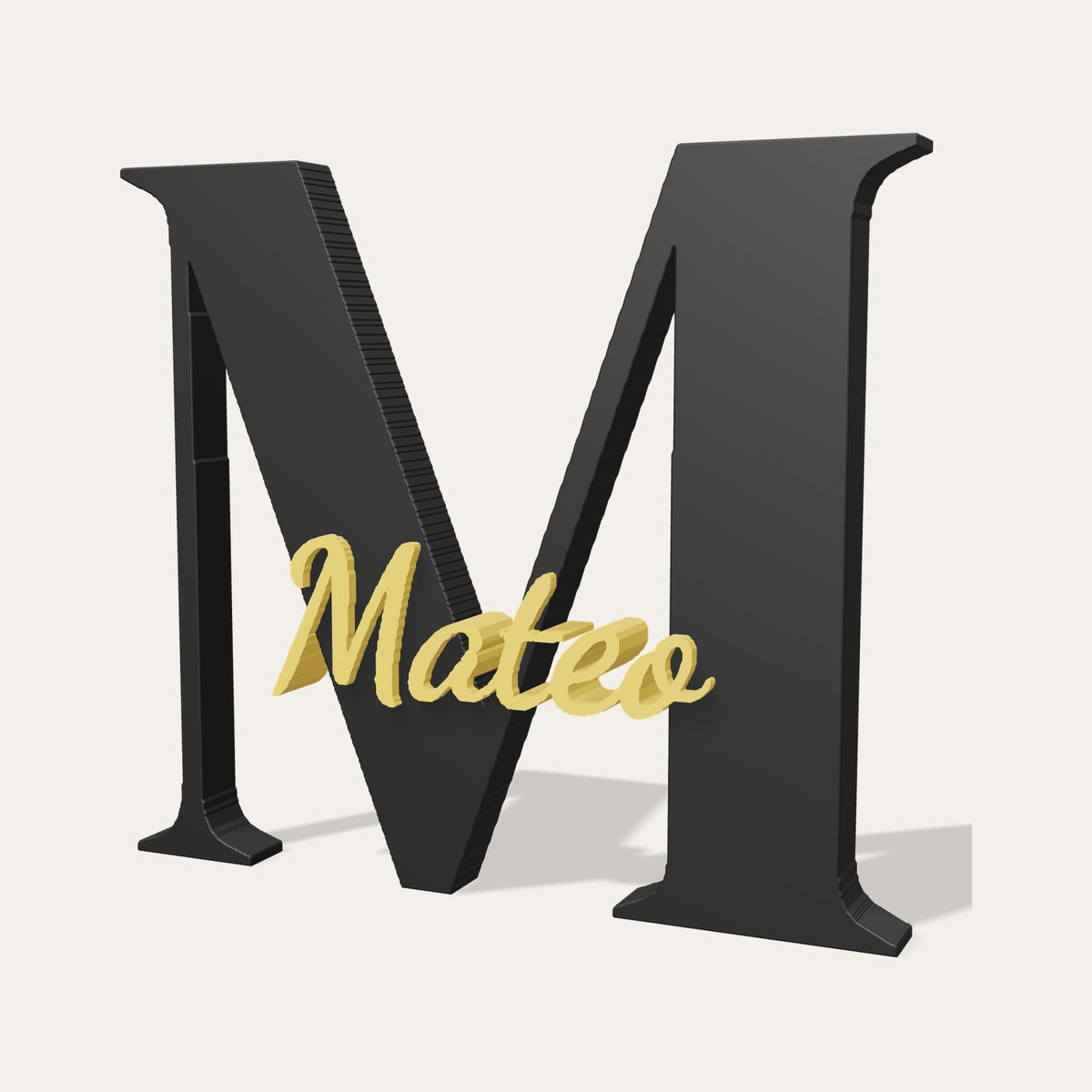 Letra 3D M negra con el nombre Mateo en relieve dorado