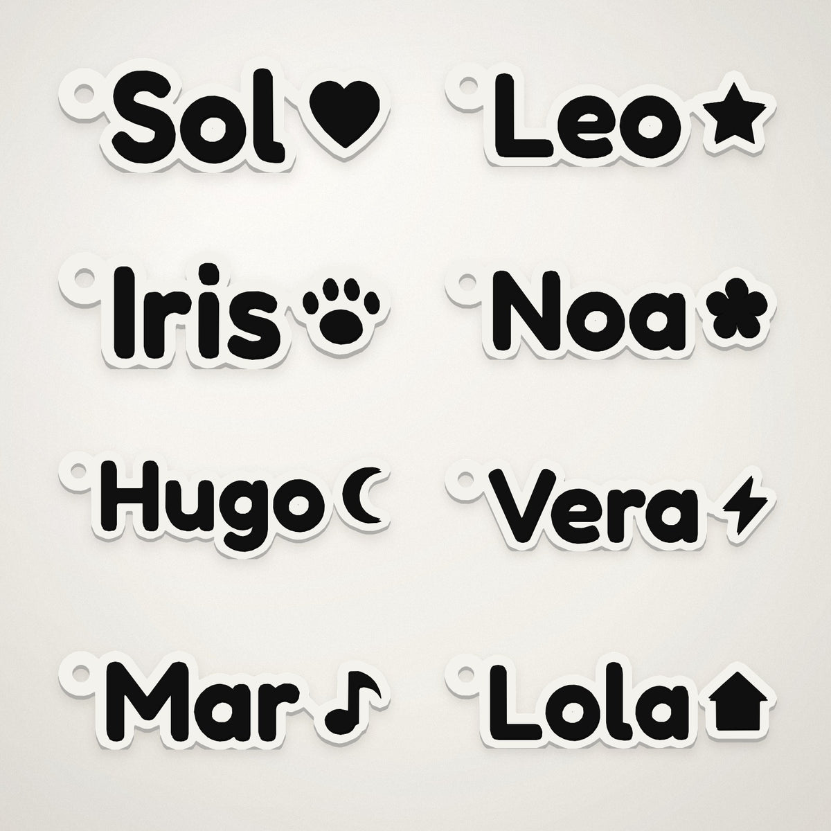 Los ocho dibujos del llavero con nombre: corazón, estrella, huella, flor, luna, rayo, nota musical y casa