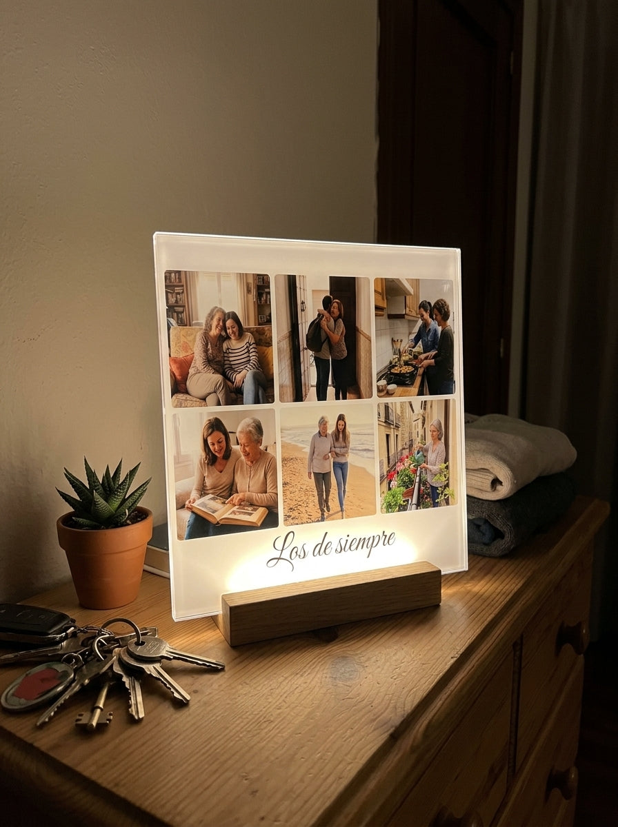 Placa de metacrilato personalizada con seis fotos encendida de noche sobre una cómoda